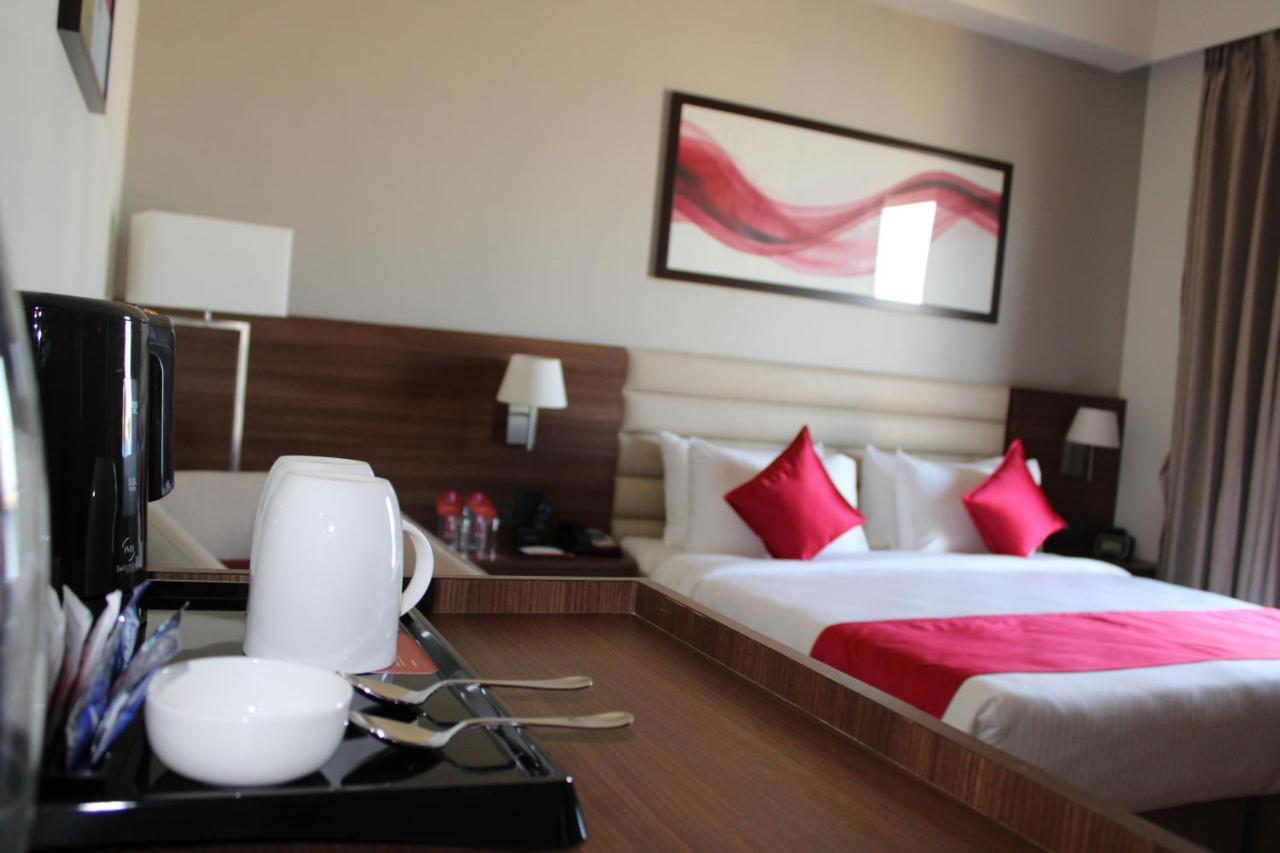 Hotel Ramada By Wyndham Gandhidham Shinay Exterior foto