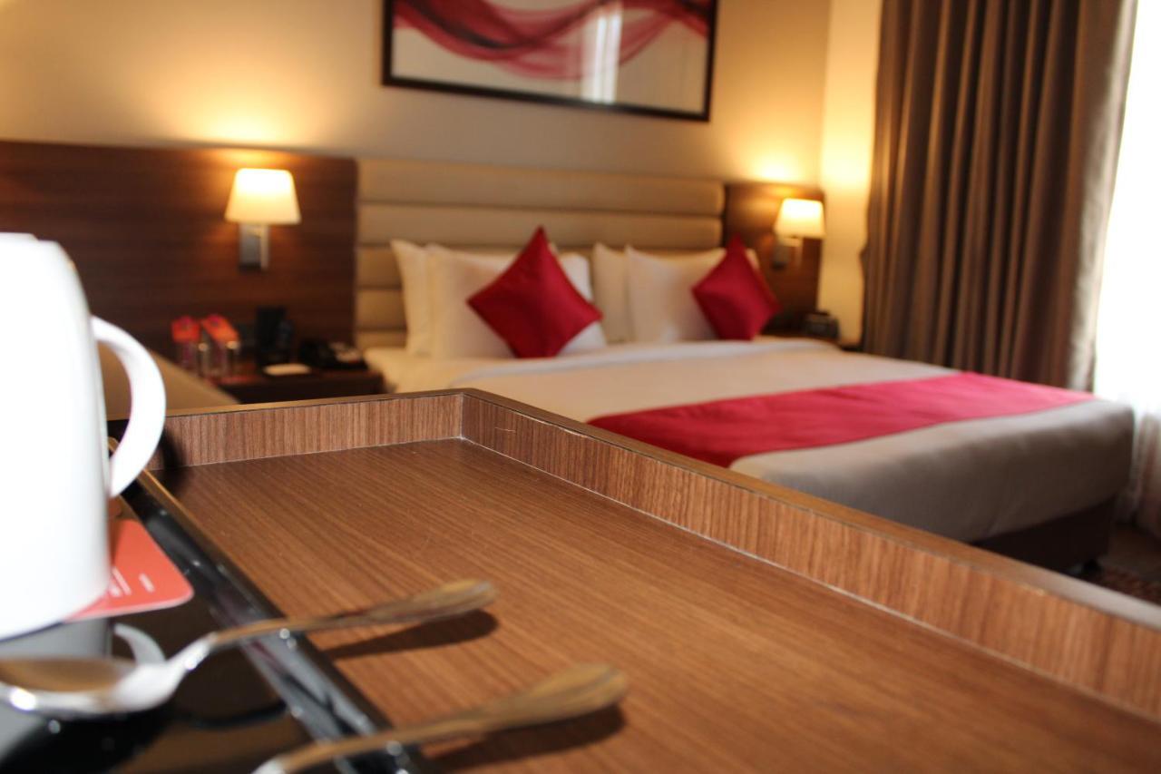Hotel Ramada By Wyndham Gandhidham Shinay Exterior foto